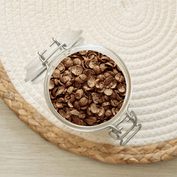 Découvrez nos chocolunes, une fusion délicieuse de céréales croustillantes enrobées de chocolat. Parfaits pour le petit déjeuner ou en encas, ces pépites gourmandes allient le plaisir du cacao à la légèreté des céréales.