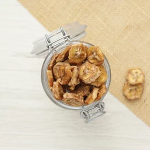 Découvrez nos bananes séchées, une gourmandise saine aux saveurs concentrées et naturelles. Elles sont délicatement préparées pour conserver la douceur de la banane fraîche tout en offrant une texture tendre et agréable. Elles sont idéales comme collation nutritive ou comme ingrédient dans vos recettes. Vous pouvez les déguster seules pour un en-cas rapide ou les ajouter à vos céréales, granolas, ou pâtisseries pour une touche sucrée et savoureuse. En plus de leur goût délicieux, nos bananes séchées sont riches en fibres, vitamines et minéraux essentiels. Découvrez comment elles peuvent enrichir vos moments gourmands et vous offrir une expérience de collation équilibrée et agréable.